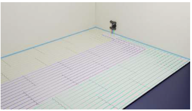 Stap 3 – Vloerverwarmingsbuizen plaatsen in sleuven (Uniwarm)